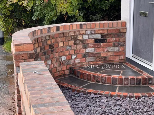 Curved front wall and steps