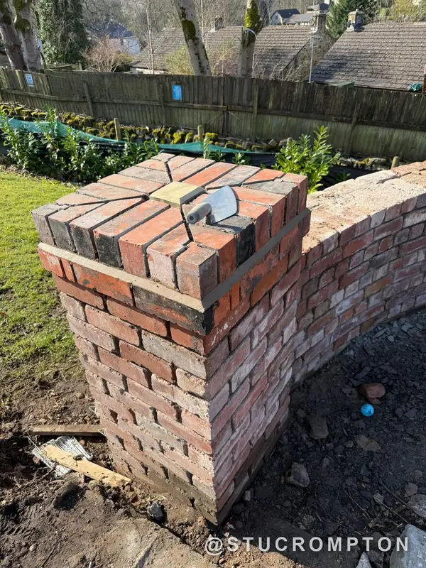 Reclaimed brick pier with a star cap