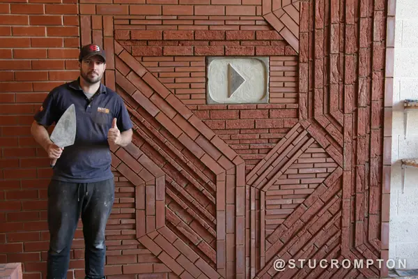 With the YouTube play button wall